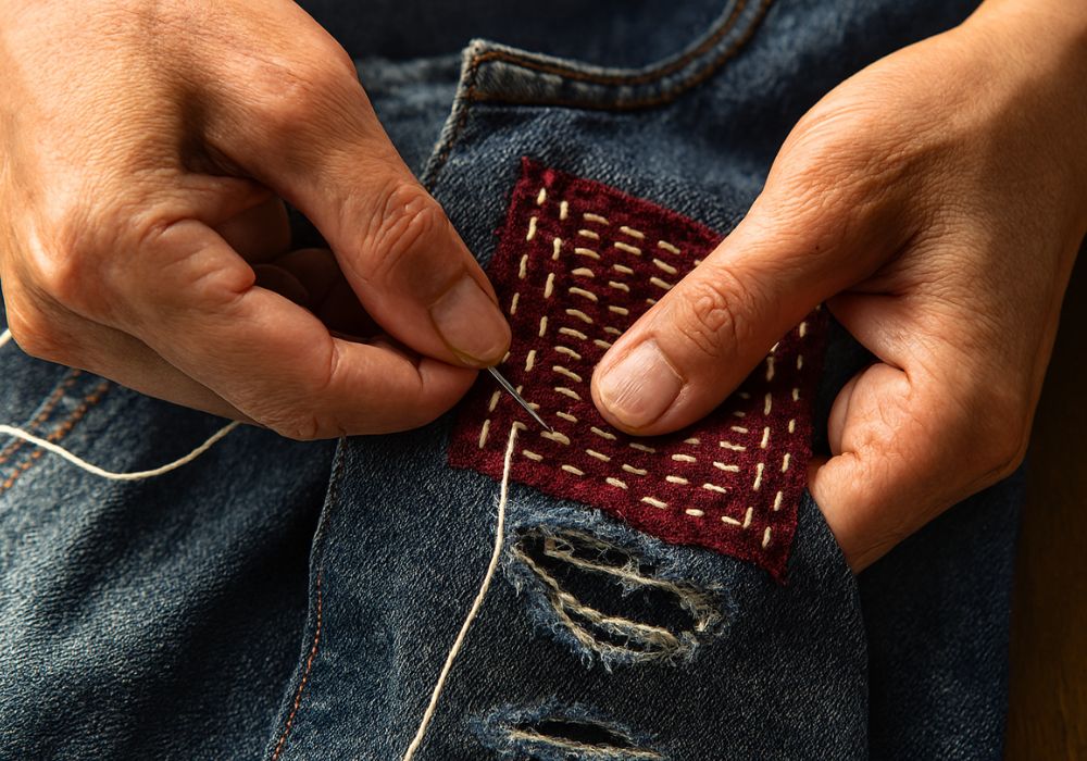 How to build a sustainable wardrobe on a budget visible mending sashiko stitching